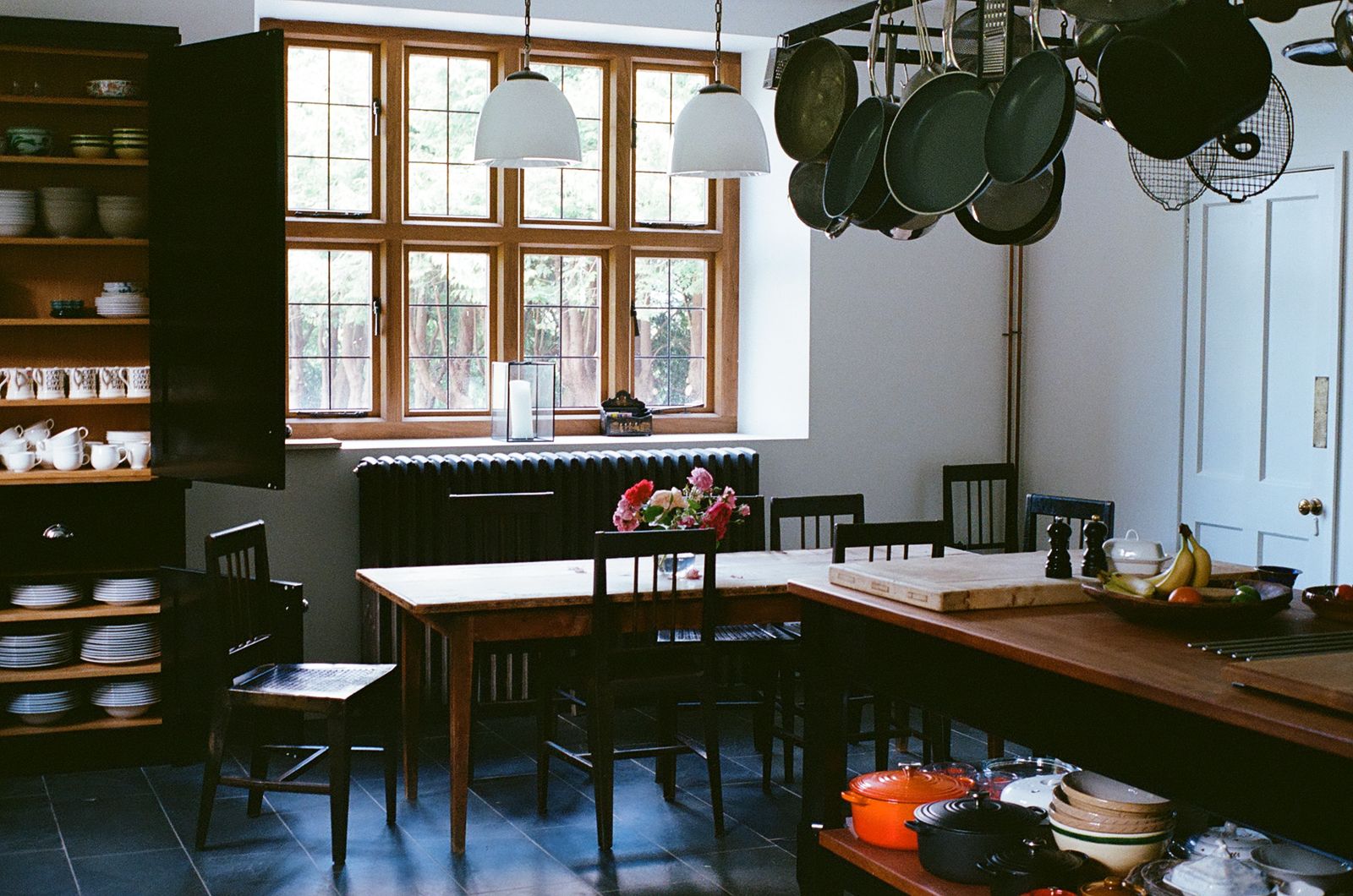 Image may contain Architecture Building Dining Room Dining Table Furniture Indoors Room Table and Chair
