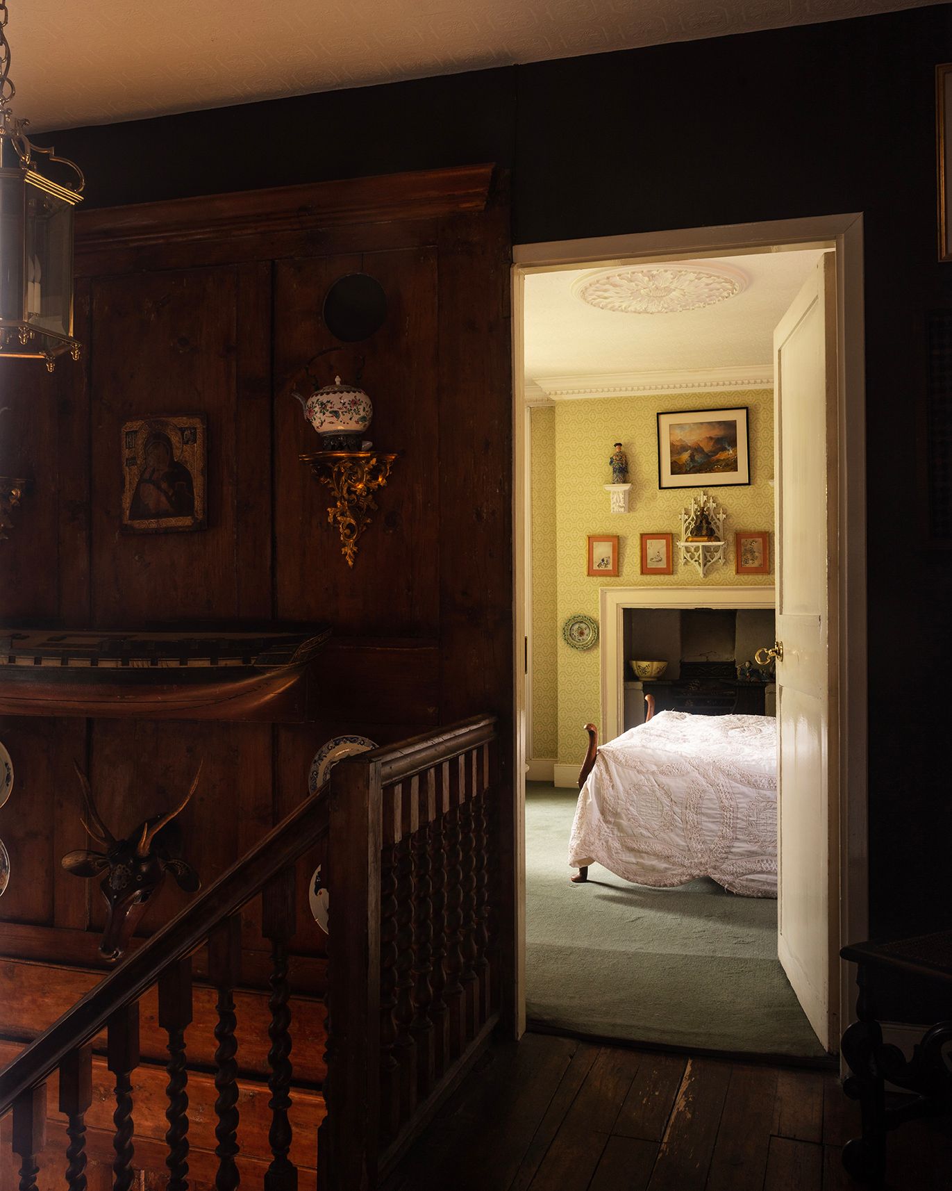 Wall brackets are a constant feature of the house often displaying the Chinese ceramics that fascinated Charles from an...