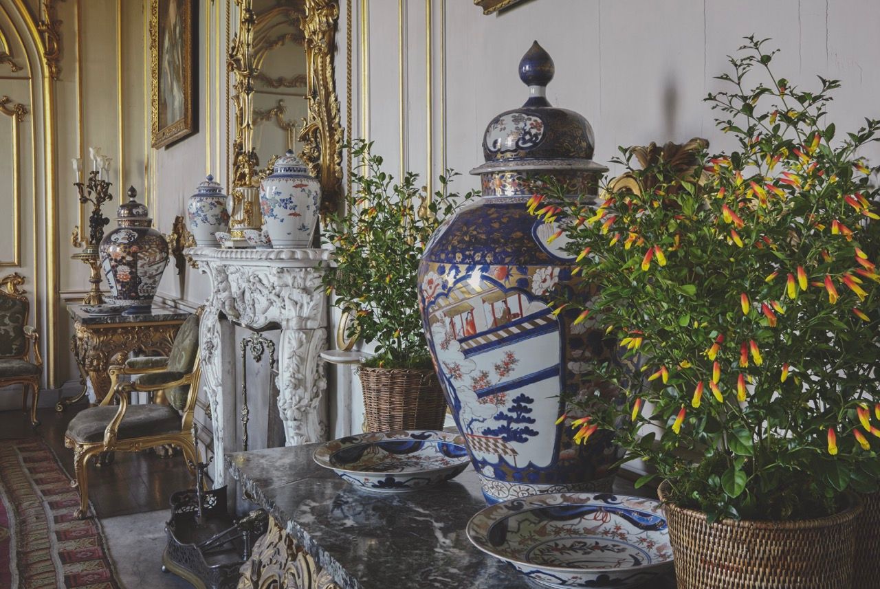Image may contain Pottery Chair Furniture Plant Potted Plant Jar Table Tabletop Art Painting Plate and Home Decor