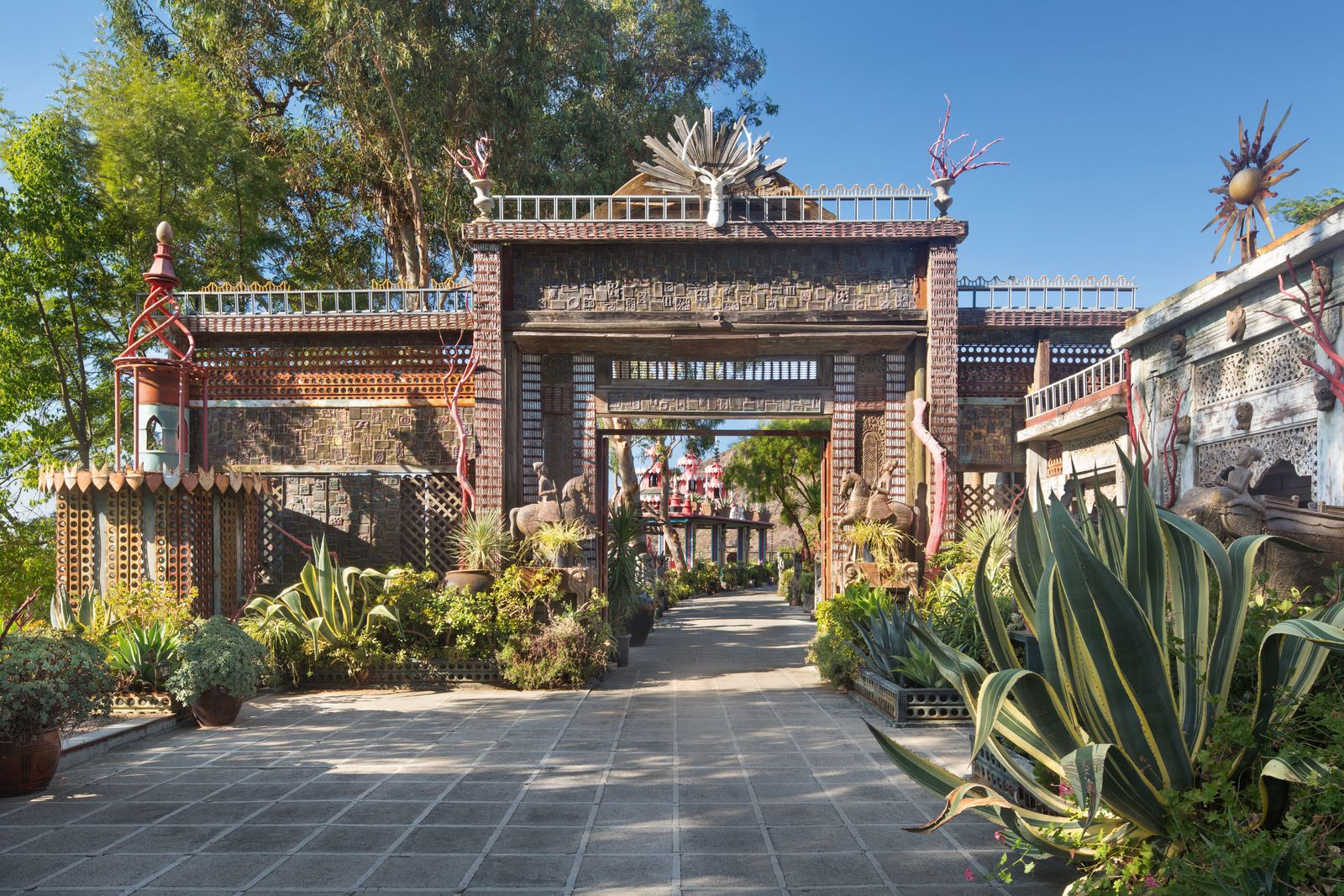 Image may contain Architecture Building House Housing Villa Plant Garden Nature and Outdoors