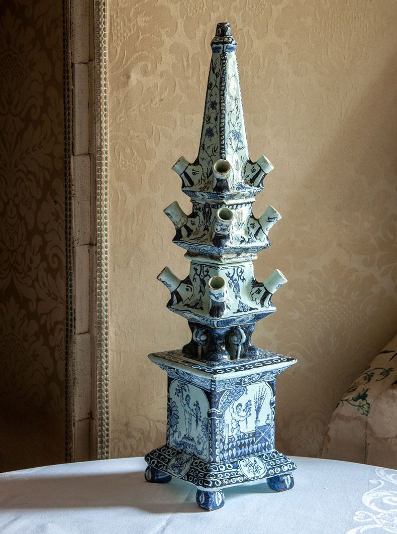 Image may contain Candle Candlestick and Furniture