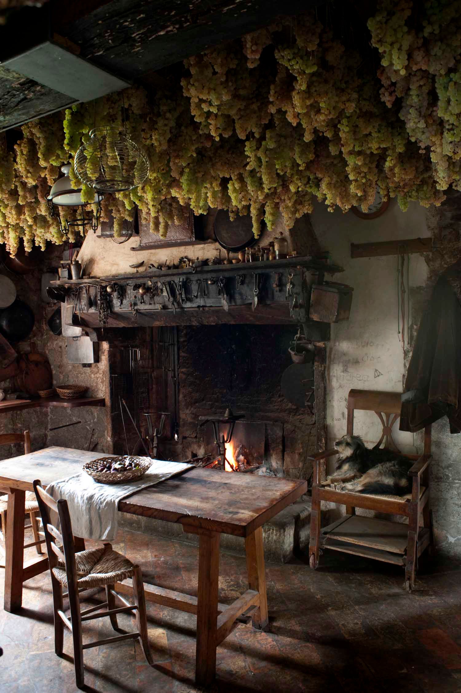 Image may contain Fireplace Indoors Dining Table Furniture Table Chair Architecture Building Dining Room and Room