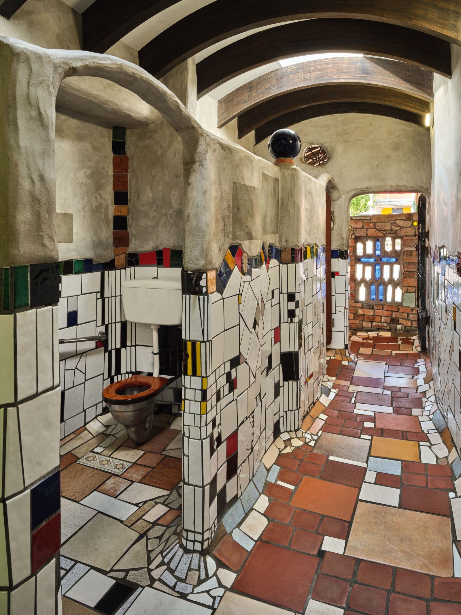 Image may contain Floor Path Walkway Tile Flooring Flagstone Architecture Building Corridor Indoors and Bathroom