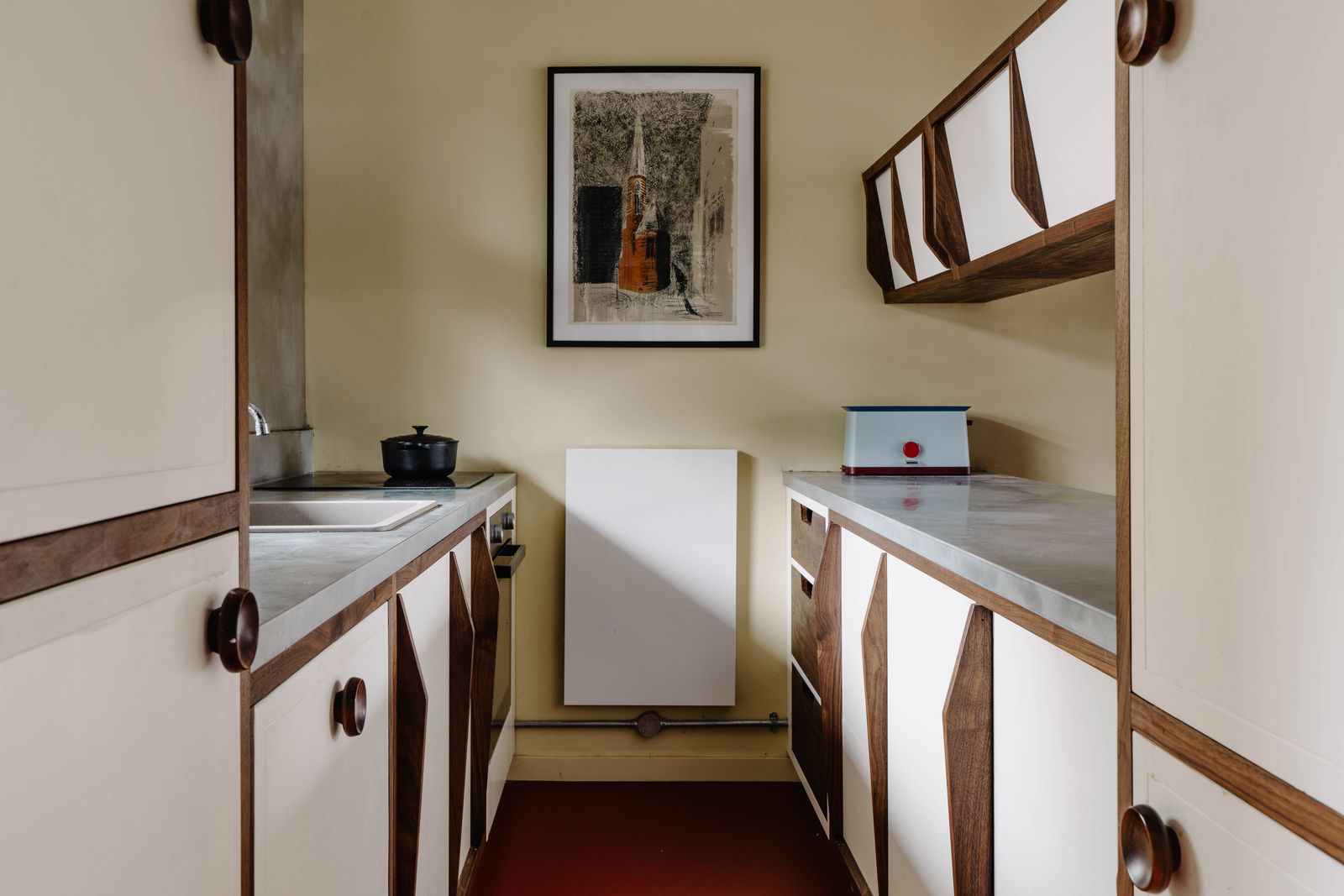 Image may contain Corner Indoors Interior Design Furniture Sideboard Sink Art Painting and Wood