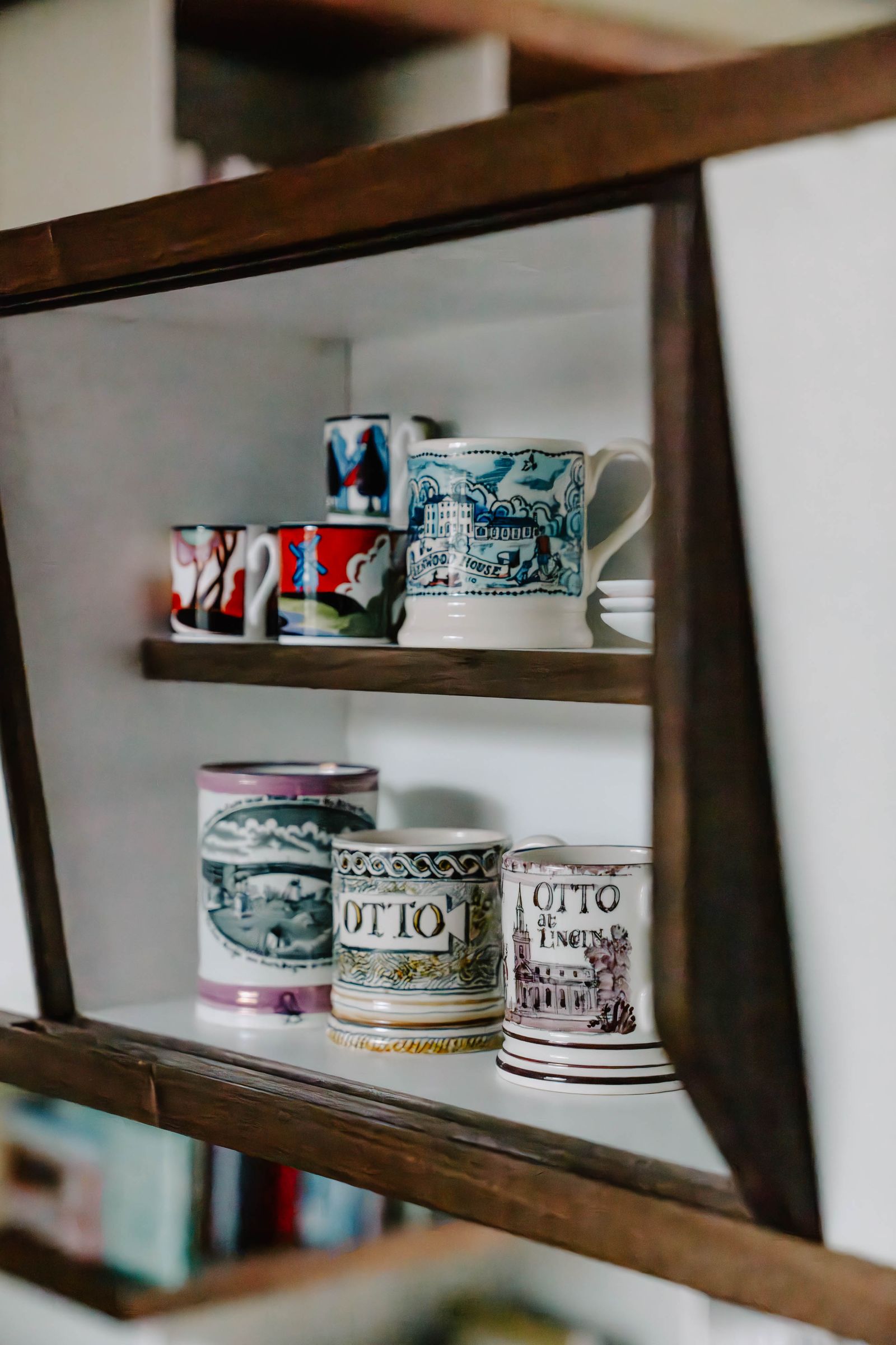 Image may contain Shelf Cup Furniture and Tape