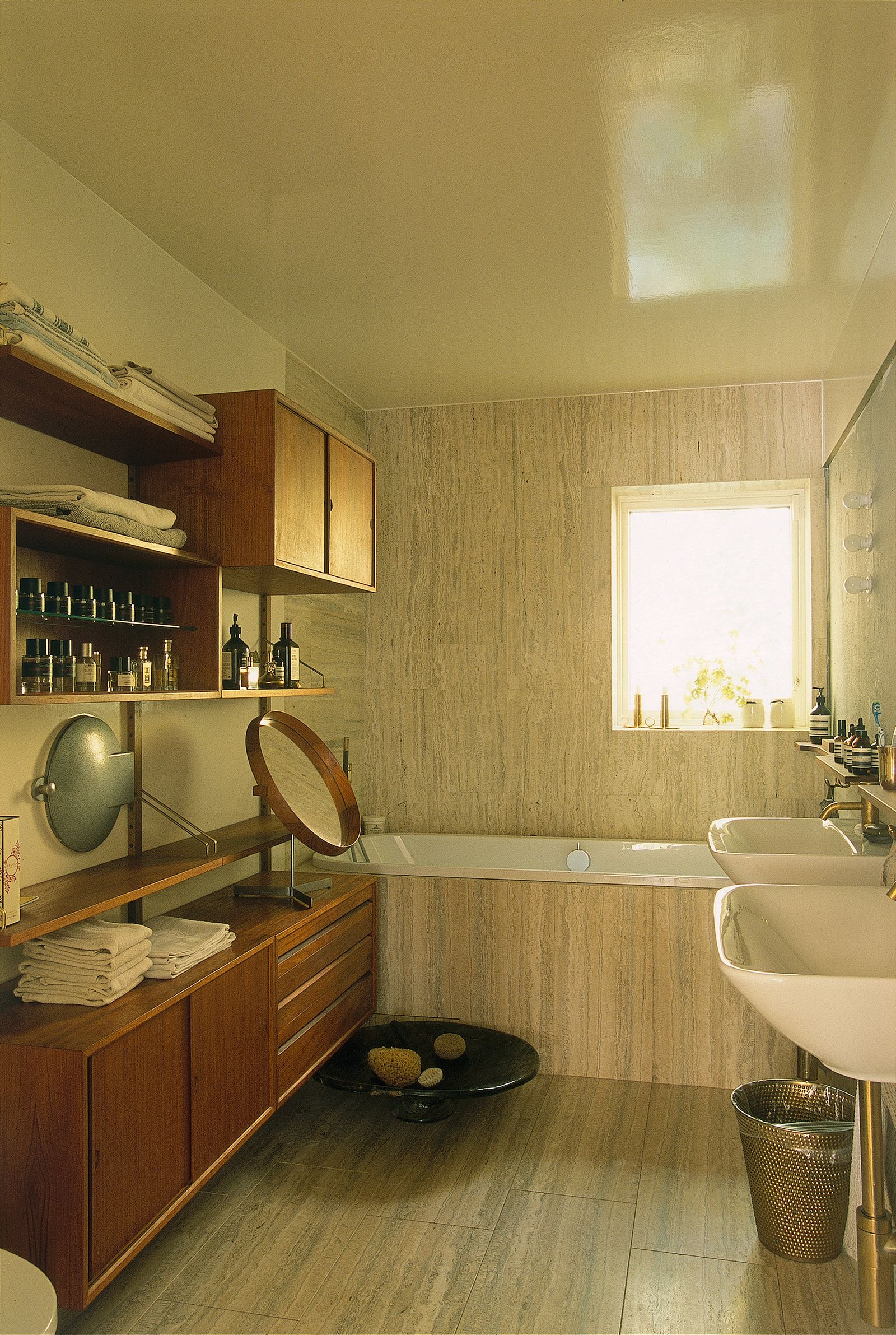 Image may contain Indoors Interior Design Sink Sink Faucet Wood Bathing Bathtub Person Tub Bread and Food