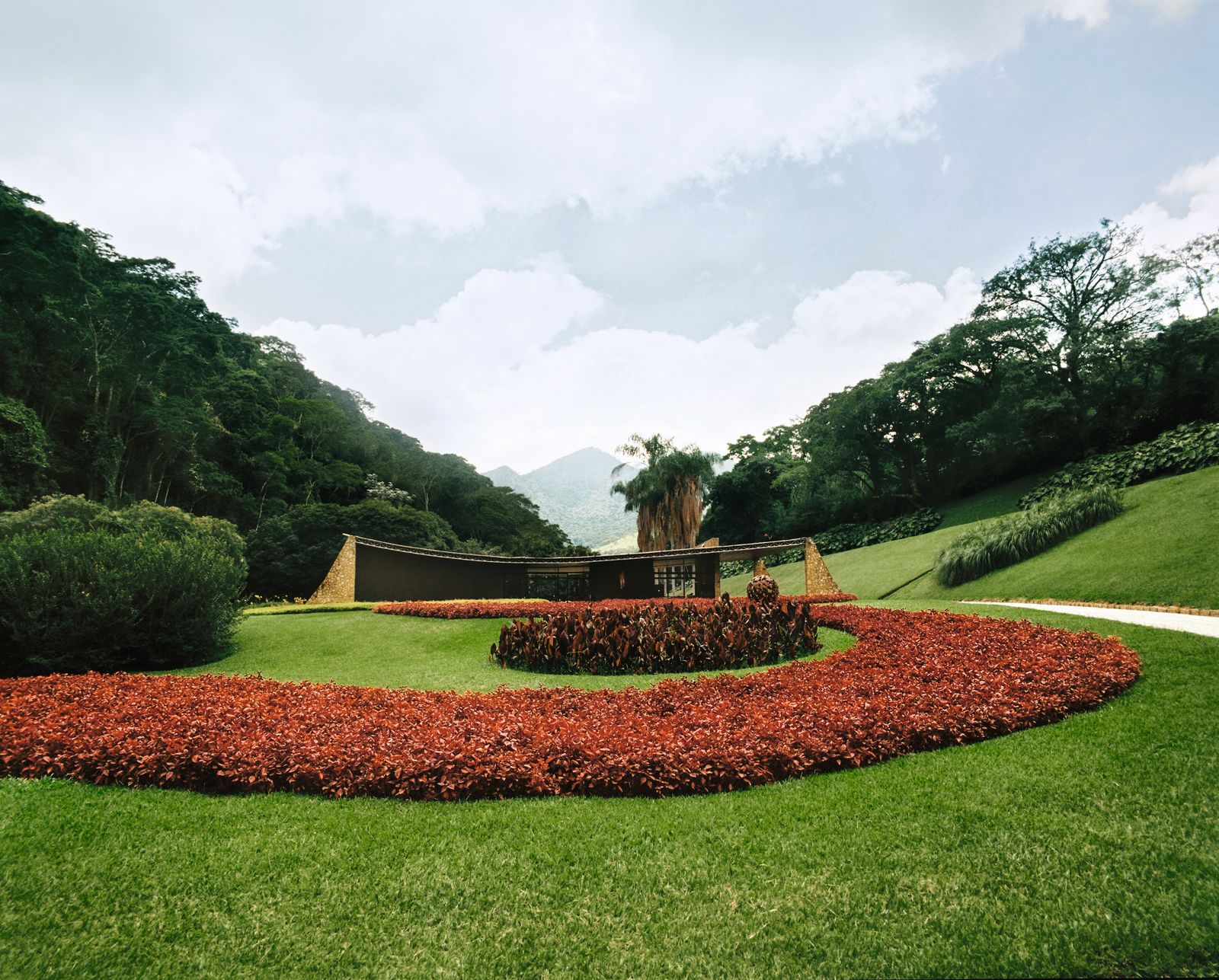 Image may contain Grass Plant Nature Outdoors Park Architecture Building Hotel Resort Lawn Tree and Vegetation