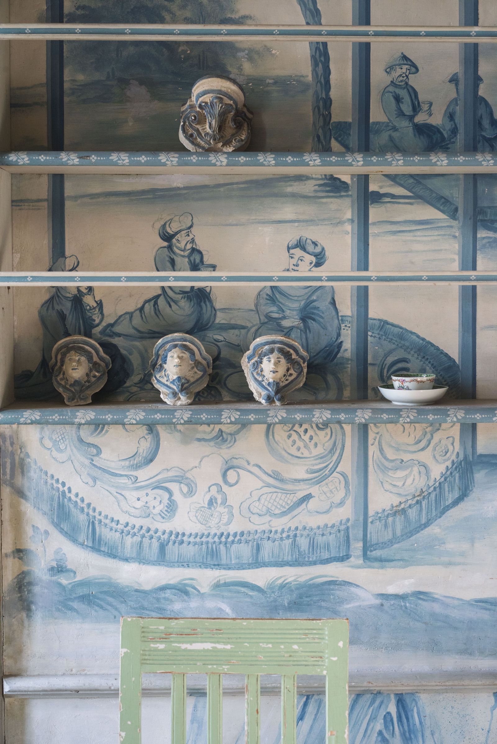Image may contain Bertha von Suttner Emperor Gaozu of Han Chair Furniture Indoors Interior Design Person and Cabinet