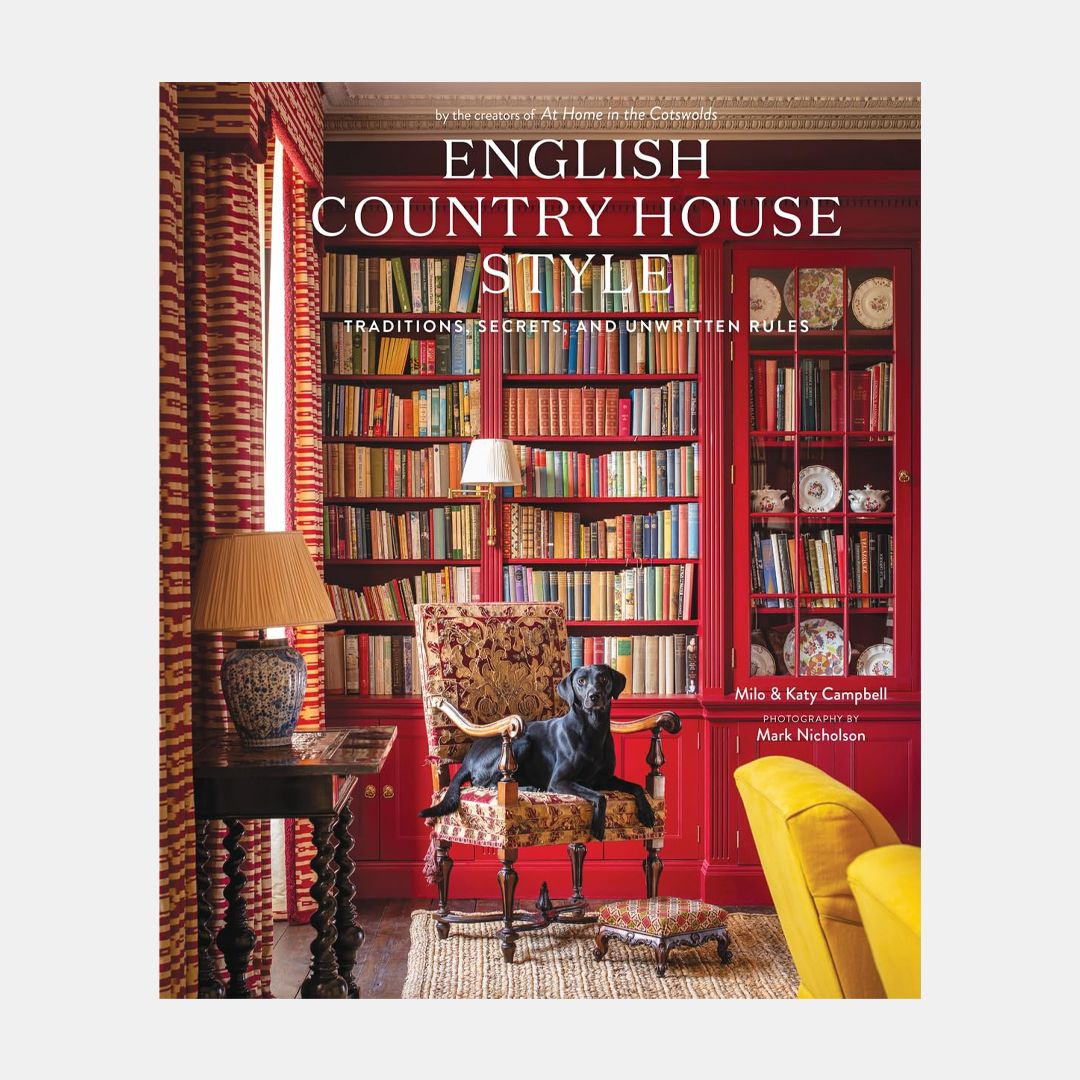 Image may contain: Lamp, Chair, Furniture, Indoors, Interior Design, Book, Publication, Library, Home Decor, Rug, and Desk