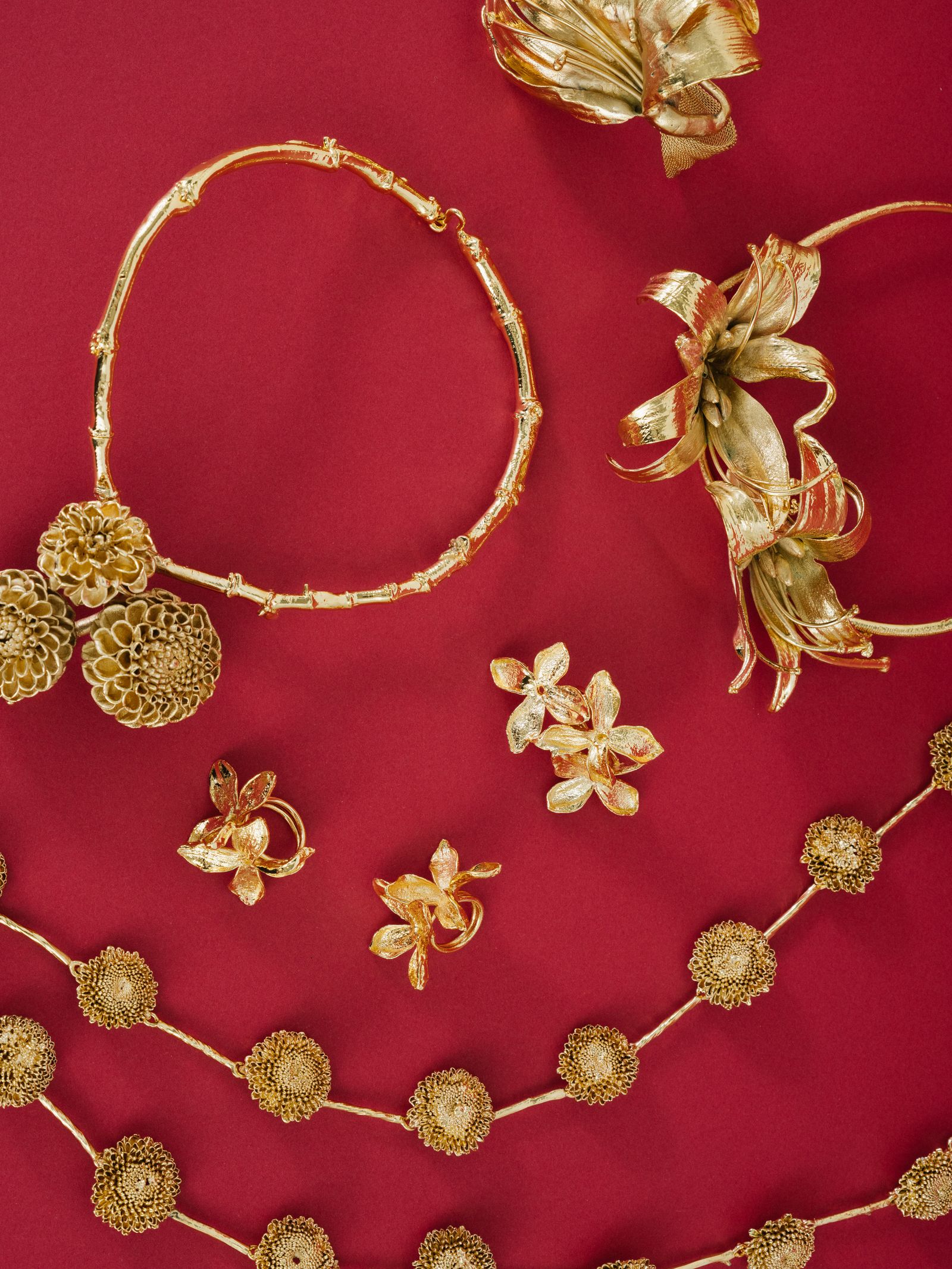 Image may contain Accessories Jewelry Necklace and Earring
