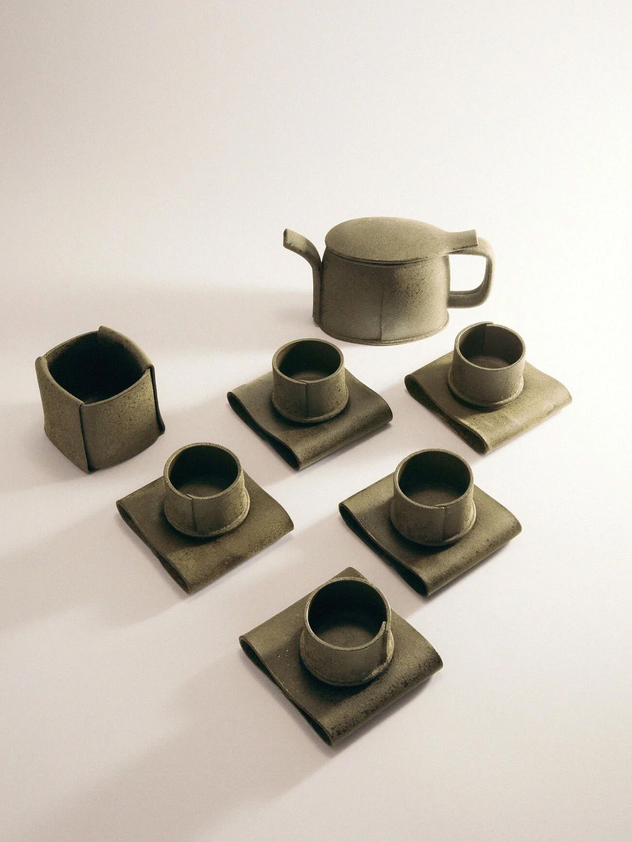 Image may contain Pottery Cup Cookware Pot Art Porcelain and Teapot