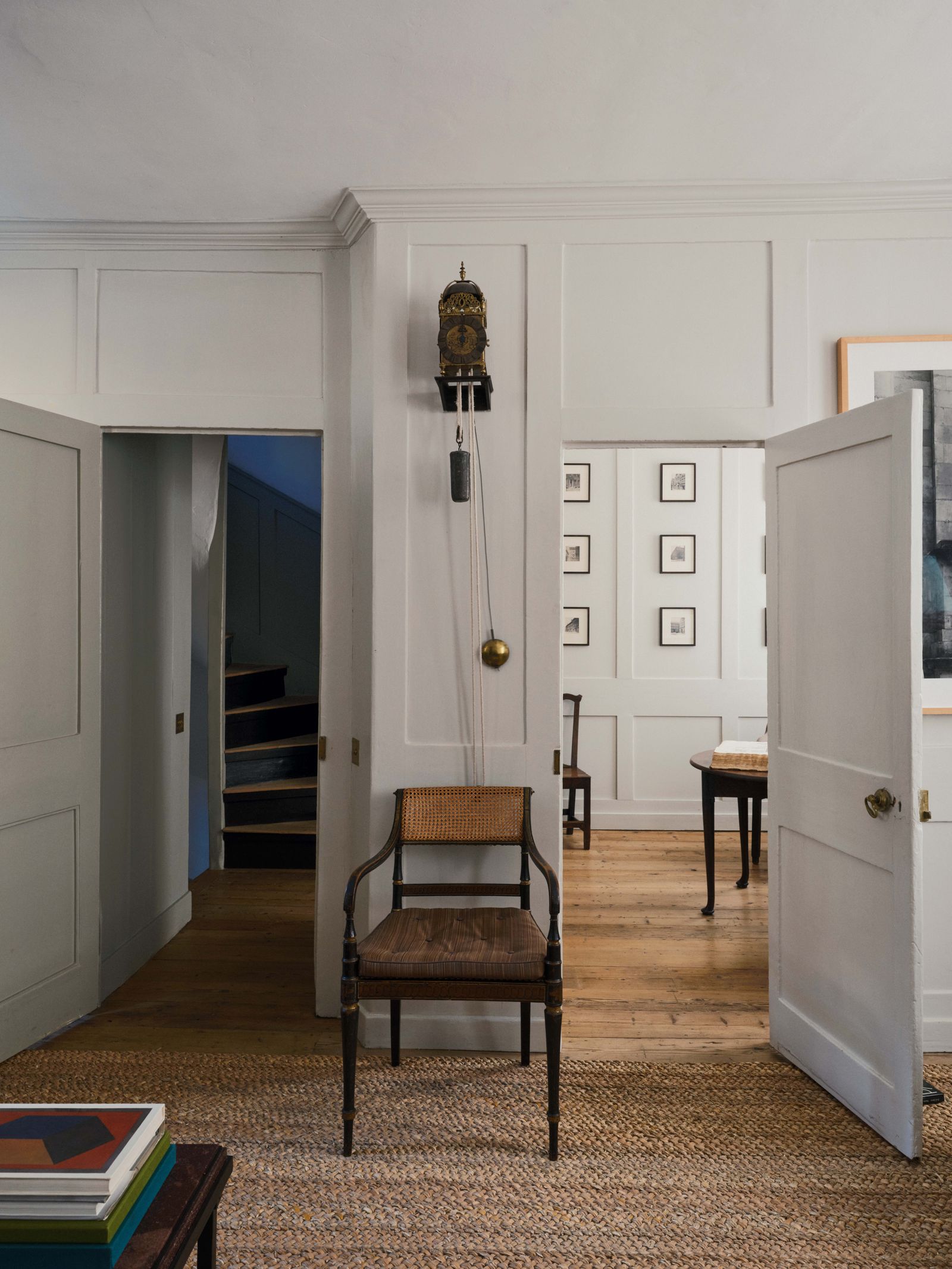 Image may contain Indoors Interior Design Chair Furniture Home Decor Rug Desk Table Floor and Architecture