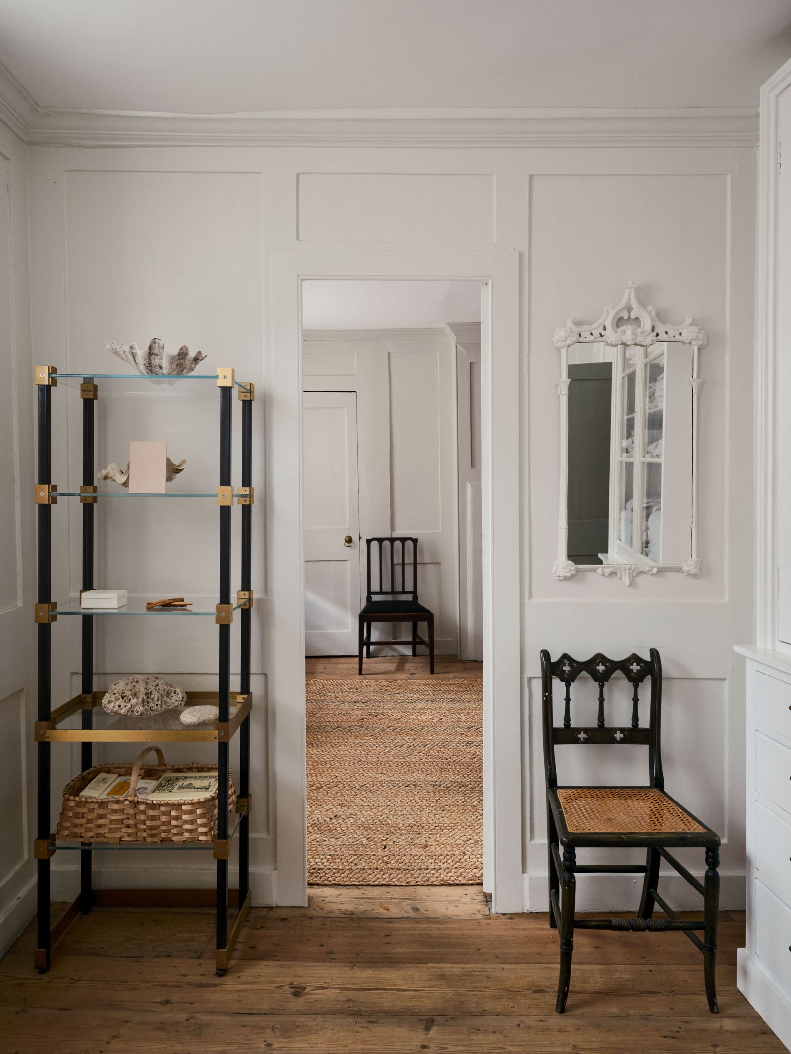 Image may contain Indoors Interior Design Chair Furniture Home Decor Rug Floor Corner Shelf Dressing Room and Room