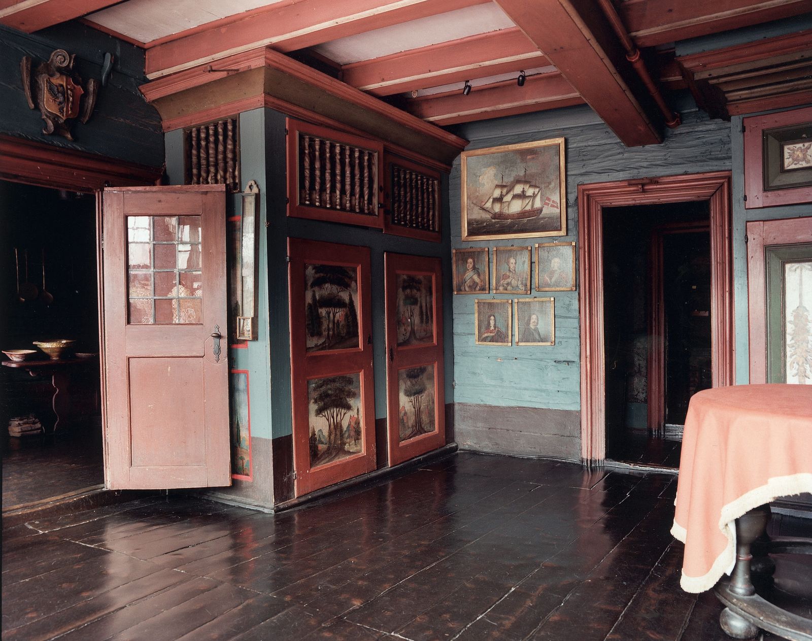 Image may contain Floor Flooring Wood Indoors Interior Design Art Painting Hardwood Desk Furniture and Table