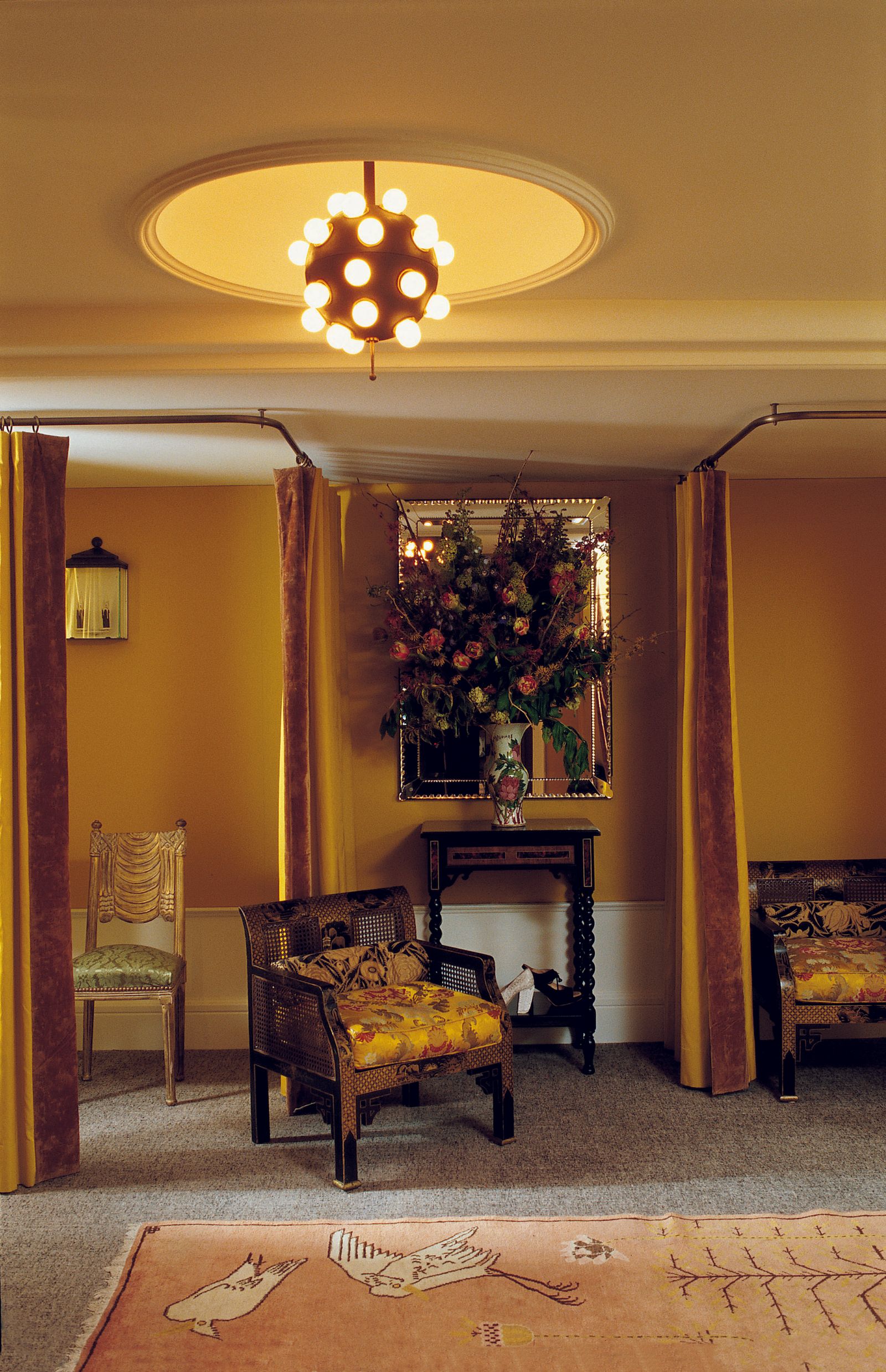 Image may contain Architecture Building Furniture Indoors Living Room Room Chair Chandelier Lamp and Floor