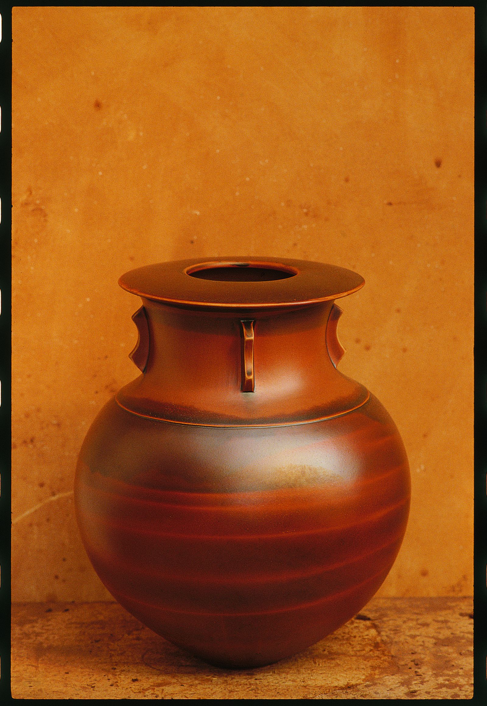 Image may contain Jar Pottery Cookware Pot and Urn